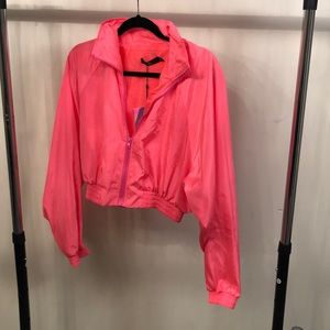 Bright neon pink windbreaker